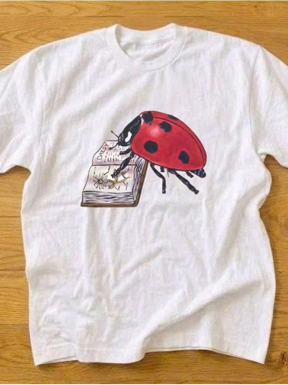 Ladybug White Short Sleeve Tee with Red Ladybug Graphic